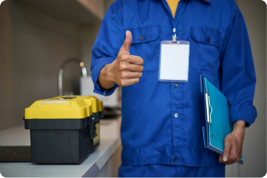 unrecognizable-male-plumber-standing-near-kitchen-sink-showing-thumb-up